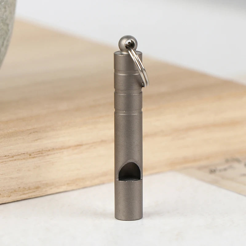 Titanium emergency whistle